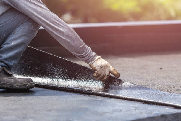 Professional Basement Waterproofing technician working in Montclair, VA